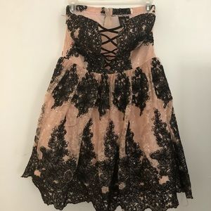 Sleeveless light pink homecoming dress